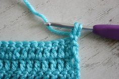 the crochet stitch is being worked on