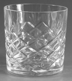 a clear glass cup sitting on top of a table