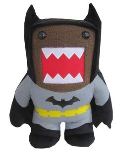 a stuffed animal with an open mouth and teeth in the shape of a batman costume