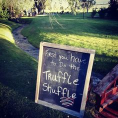 a chalkboard sign that says first you have to do the truffle shuffle