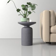 a living room with a couch, chair and potted plant on the side table