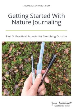 someone holding two pens in their hand with the title getting started with nature journaling