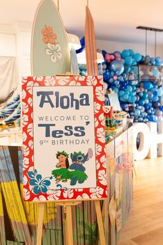 there is a sign that says aloha welcome to tass 9th birthday