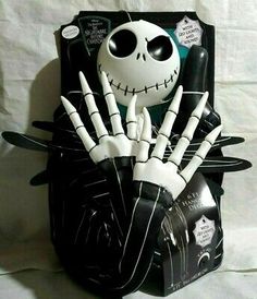 a halloween decoration with skeleton hands in a box