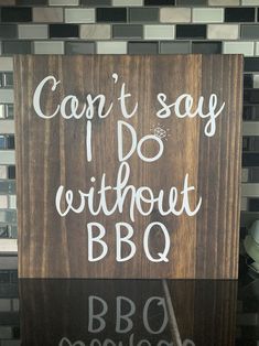 a wooden sign that says can't say i do without bbq