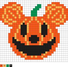 a cross stitch pattern with an image of a pumpkin in the shape of a face