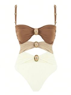 two pieces of swimsuit with buttons on the front and bottom, one in beige and one in white