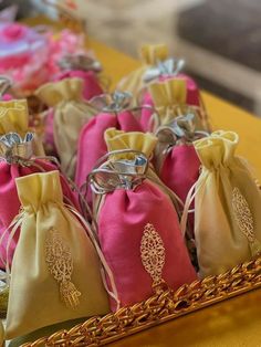 several bags with ties are sitting on a table