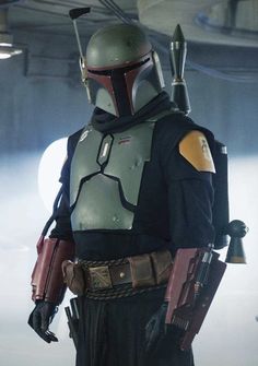 boba fett from the star wars movie is standing in a room with lights on