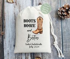 a drawsack bag with the words boots, booze and bride's date printed on it