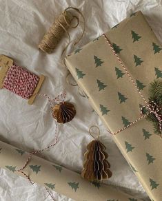 wrapping paper, twine and christmas tree decorations