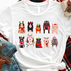 Merry Christmas Pig Shirt, Pigmas Christmas Sweatshirt, Merry Pigmas Holiday Sweater, Christmas Farm Animals Shirt, Pig Christmas Animal Tee ----------------------------------------------------------------- ** How to order? ** 1. Please check all pictures and choose your T-shirt Size and Color. 2. Choose your quantity as much as you want. 3. Please enter custom Design Color and Personalization Box (if applicable) 4. PLEASE secure all steps of your order 5. After You add your note, Please Click "Proceed to Checkout" After selecting the order, please check the address and parameters again. Product Details:✨  INFORMATION  We offer a variety of shirts: * Adult Unisex Tee: 5.3-ounce, 100% cotton (99/1 cotton/poly (Ash) & 90/10 cotton/poly (Sport Grey), 50/50 cotton/poly (Dark Heather) Made with Christmas Farm Animals, Pig Shirt, Pig Christmas, Pig Shirts, Christmas Farm, Holiday Sweater, Toddler Tees, Animal Shirts, Christmas Animals