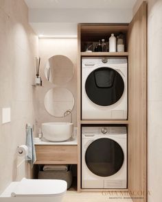 a washer and dryer in a small bathroom with wooden shelves on the wall