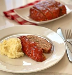 meatloaf and mashed potatoes on a white plate