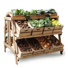 an assortment of fruits and vegetables on display in wooden crates with dividers to each side