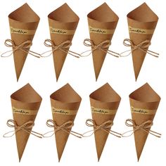 brown paper cones tied with twine on white background, set of 8 for decoration