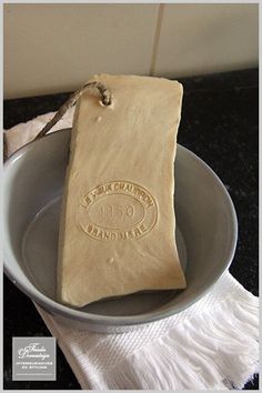 a piece of wax paper sitting on top of a white plate