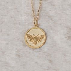 Gold Moth Pendant - Butterfly Gold Necklace ● Material of pendant: Solid Gold 14k ( REAL GOLD ) ● Metal Stamp: 14k ( REAL GOLD ) ● The pendant is available in 5 sizes: - 12,7 mm / 0.5 inches (Diameter) - 14,0 mm / 0,55 inches ( Diameter ) In the photos - 15,3 mm / 0.6 inches ( Diameter ) - 16,5 mm / 0,65 inches ( Diameter ) - 19,1 mm / 0,75 inches ( Diameter ) ( In the photos the size is 14mm / 0.55 inches Diameter ) ( Jump Ring inner diameter: 4 mm ) ● Material of chain: Solid gold 14k ( REAL GOLD ) It is thin and dainty and it is available in 4 sizes: - 40 cm / 15,75 inches ( Length ) - 45 cm / 17,72 inches ( Length ) In the photos - 50 cm / 19,68 inches ( Length ) - 55 cm / 21,65 inches ( Length ) ● Backside engraving is FREE ( Please use the personalization box for that.) ● If you want Moth Pendant, Moth Necklace, Moon Moth, Animal Pendant, Luna Moth, Butterfly Jewelry, We Can Do It, Necklace Personalized, Mom Birthday