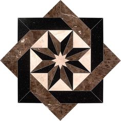 a black and white tile with a star design on the center, surrounded by smaller squares