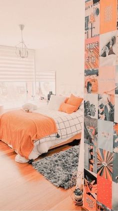 a bedroom with orange and white decor on the walls