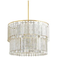 a chandelier with white and gold accents