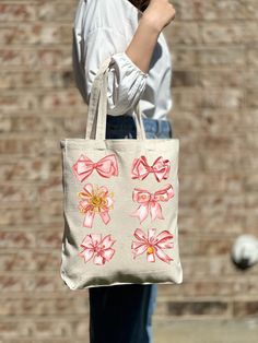 Woman Bows Tote Bag, Hearts Tote Bag, Casual Tote Bag, Cute Tote, Women Shoulder Tote Bag, Gift For Women, Tote Bag Aesthetic 🎉 Welcome to Our Eco-Chic Boutique! 🎉 💐 We're Absolutely Delighted to Have You! 💐 Diving into our boutique feels like uncovering a secret garden of treasures, all thoughtfully selected with you in mind. Our mission is to fill your world with joy and satisfaction, handpicking each piece to ensure your shopping journey with us is nothing short of wonderful. 🌿 A Persona Large Capacity Shoulder Bag For Gifts, Large Capacity Shoulder Bag Gift, Large Capacity Satchel Bag As Gift, Trendy Large Capacity Bags For Gifts, Beige Handheld Bag For Gifts, Beige Handheld Bag As Gift, Beige Handheld Bag For Gift, White Square Canvas Bag As Gift, Cute Beige Shoulder Bag As Gift