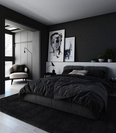 a black and white bedroom with a large bed