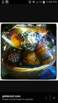 a basket filled with lots of food on top of a table