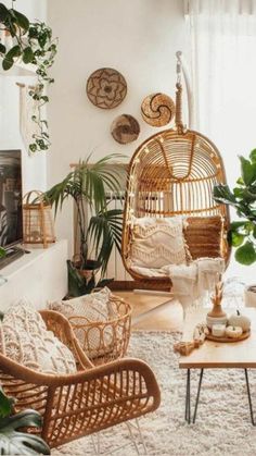 a living room with wicker furniture and plants