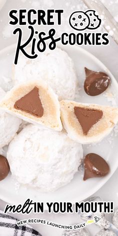 a white plate topped with cookies covered in chocolate