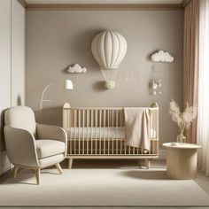 a baby's room with a crib, rocking chair and hot air balloon