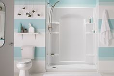 a bathroom with blue and white striped walls