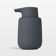 a gray soap dispenser on a white background