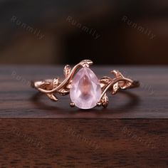 Here we have a Pear cut rose quartz ring vintage twig leaf design ring women unique nature inspired engagement ring rose gold wedding ring pink stone ring. This is the perfect gift for mom, wife, fiancee, girlfriend, valentine, daughter, family or friend. It is a special gift for mother's day, valentine's day, wedding, anniversary, birthday, Christmas, Easter, New Year's and any holiday. You can choose if you want 14Kt White Gold, 14Kt Yellow Gold or 14Kt Rose Gold. Emerald Ring: https://www.ets Rose Quartz Gold Ring, Wedding Ring Pink, Promise Ring For Men, Wax Seal Ring, Rose Gold Emerald Ring, Rose Quartz Wedding, Rose Quartz Ring Engagement, Pink Stone Ring, Pink Wedding Rings