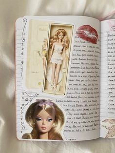 an open book with pictures of barbie dolls