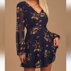 Lulus Women's Navy Blue Floral Print Long Sleeve Skater Mini Dress With Six Buttons Front Closure. Gathers On The Waist. Tie Sash. Binding Cuff With One Closure. Blue Lining. Zipper Closure Back. Nwt Measurements Approximate. Shoulder 15.5" Armpit To Armpit 19" Waist 15" Top To Bottom 43.5" Sleeve 25.5" Cuff 4" 100% Polyester, Lining 100% Polyester. Hand Wash Cold. Pretty Spring Dresses, Navy Blue Floral Dress, Long Sleeve Skater Dress, Long Sleeve Short Dress, Romantic Dress, Floral Blue Dress, Blue Floral Print, Short Wedding Dress, Guest Outfit