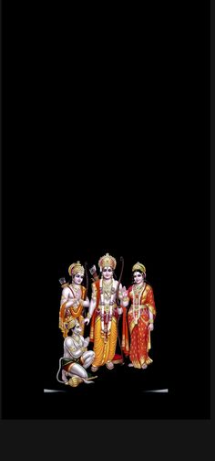 three deities sitting on the ground in front of a black background