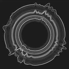 an image of a circular object in the middle of black and white lines on a dark background