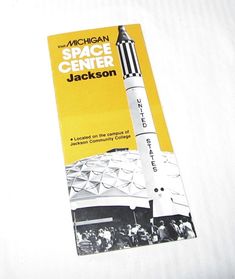 a book with an image of a rocket on it's cover and the title michigan space center jackson