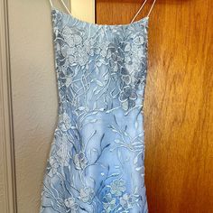 Brand New Never Worn Homecoming Dress (Came In Too Late). Light Blue Backless With Embroidered Blue Flowers, Tight Fit Super Cute! Twerp Dresses, Dusty Blue Prom Dress, Light Blue Homecoming Dress, Blue Homecoming Dress, Dresses Light Blue, 8th Grade Dance, Blue Prom Dress, Blue Homecoming Dresses, Hoco Dress