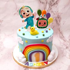 a birthday cake with a cartoon character on top