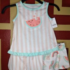 Carter's Watermelon Blush Pink & Mint Green Striped Ruffled 3 Piece Pajama Set. Cool Sleeveless Watermelon Embroidered Pajama Top With Cute Striped Ruffle Pajama Shorts And An Additional Pair In A Bright Watermelon Print. Summer Cotton Sleepover Sets, Summer Cotton Sets For Sleepovers, Cotton Summer Sets For Sleepover, Summer Pink Cotton Sleepwear, Pink Cotton Summer Sleepwear, Playful Pink Cotton Sleepwear, Playful White Sleeveless Sleepwear, Pink Summer Pajama Party Sets, Pink Summer Sets For Pajama Party