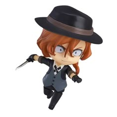 an action figure is posed in a hat and suit with a knife on his arm