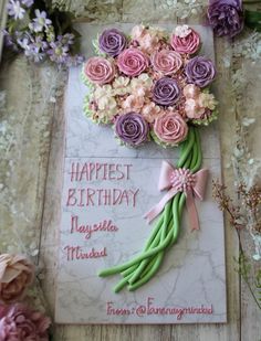 a birthday card with pink and purple flowers