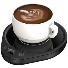 a cup of coffee on top of a digital scale