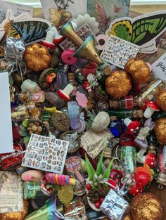 a pile of assorted items sitting on top of a table