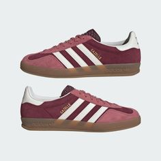 These adidas Gazelle Indoor shoes are an icon reborn. Originally released in the '70s as an indoor training shoe, the Gazelle has since become an everyday staple. This pair maintains classic details like a premium suede upper and serrated 3-Stripes. Underneath, a gum rubber outsole offers durable traction and a retro-inspired look. Adidas Gazelles, Burgundy Adidas, Adidas Gazelle, Adidas Online, Adidas Men, Style Guides, Athletic Shoes, Men's Shoes, Shoe Accessories