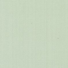 a green wallpaper with wavy lines on it