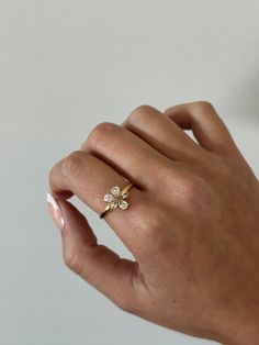 Flower ring - This adjustable dainty flower ring is incredibly stunning. Made to sparkle and shine on any finger! A perfect gift for women, girlfriend, best friends, sisters, moms. A perfect option for those who like minimal dainty gold rings and want to have the perfect size. - gold filled - stainless steel and gold - cz stones - minimalist - adjustable WHY VASI Jewelry? - Ethically sourced gems and stones - Made with recycled gold - Handmade or designed/sourced - Shop local (based in Chicago) Rose Gold Jewelry For Anniversary In Spring, Rose Gold Jewelry For Spring Anniversary, Dainty Jewelry For Anniversary In Spring, Dainty Jewelry For Spring Anniversary, Dainty Spring Jewelry For Anniversary, Delicate Jewelry For Anniversary In Spring, Delicate Jewelry For Spring Anniversary, Rose Gold Ring For Spring, Delicate Spring Jewelry For Anniversary