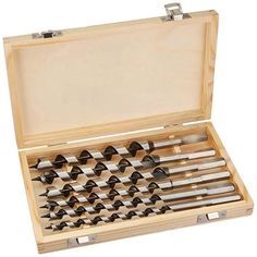 a wooden box filled with lots of silverware